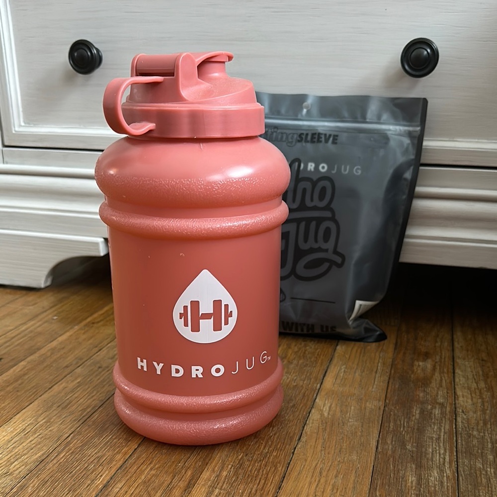 HydroJug Pink Water Bottle with black marble sleeve